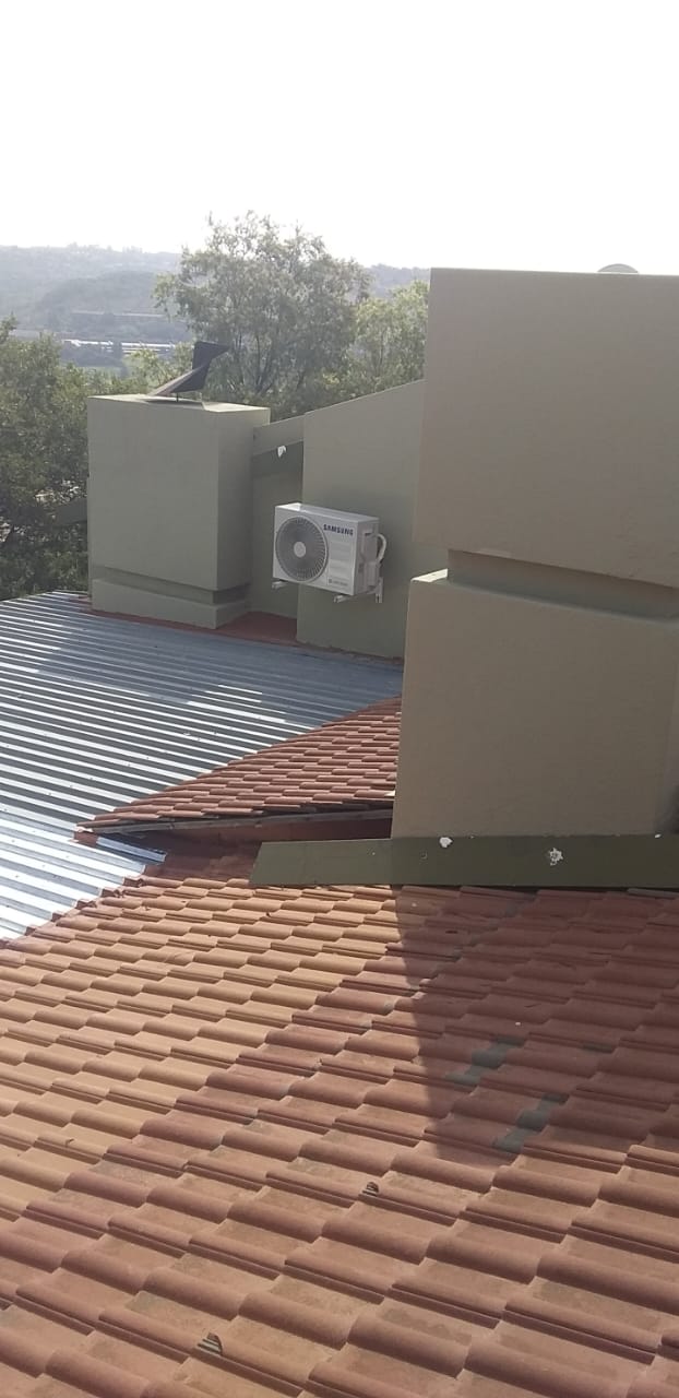 Completed HVAC installation in shopping complex retail space